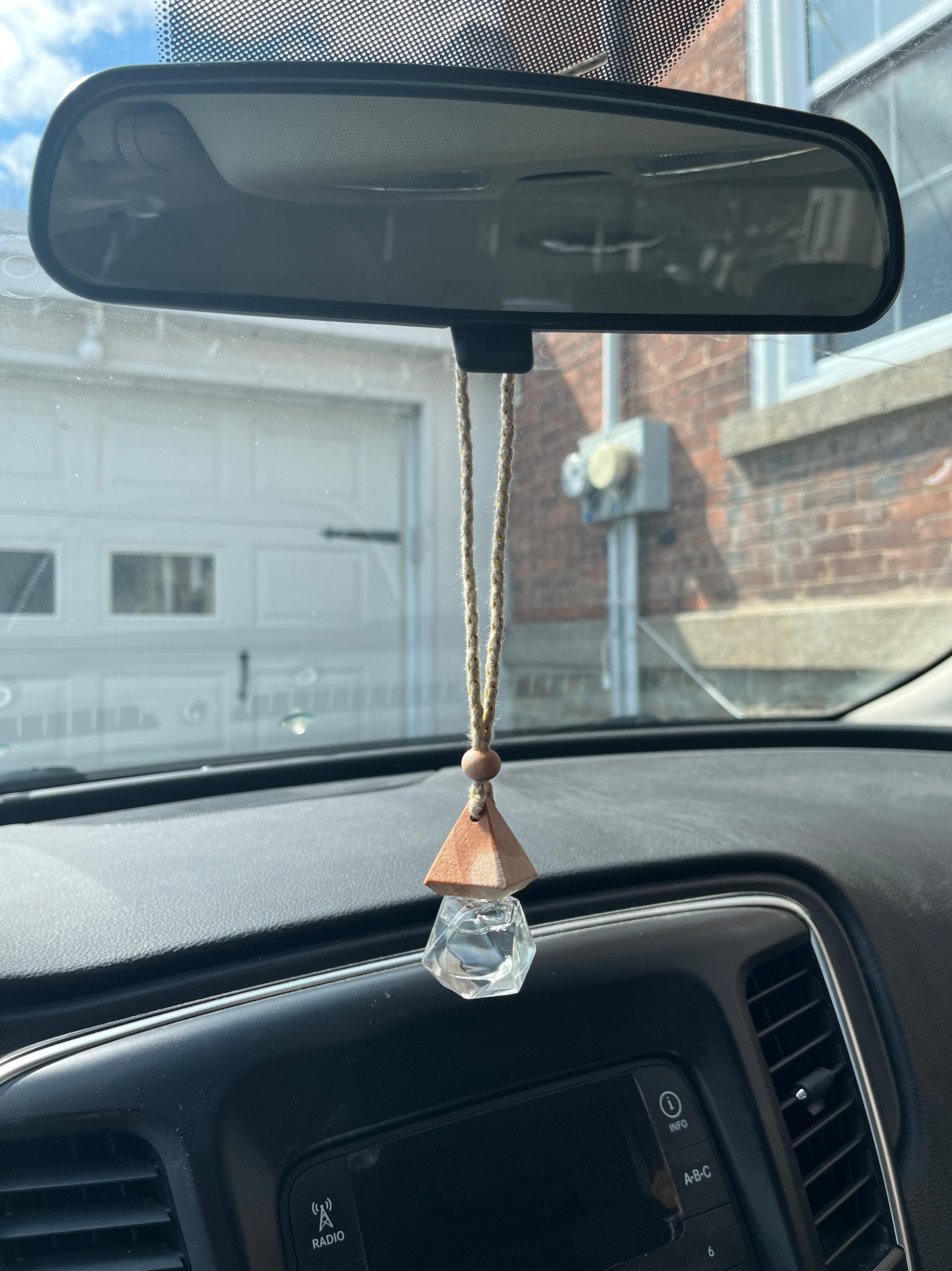 picture of car diffuser hanging on car mirror